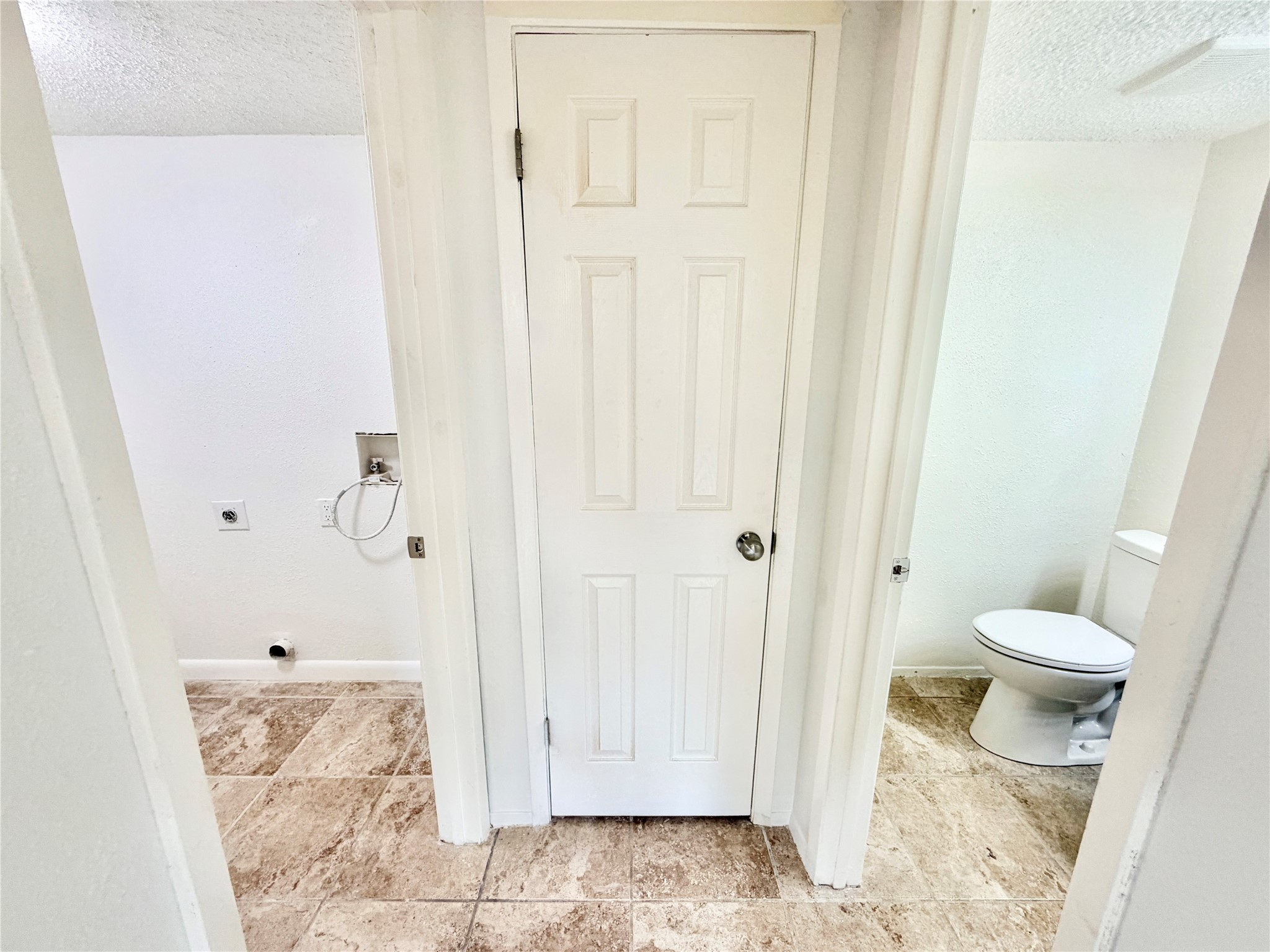 9623 Covey Ridge Lane Austin, TX 78758 - Photo 16 of 40 Bathroom featuring a textured ceiling and toilet