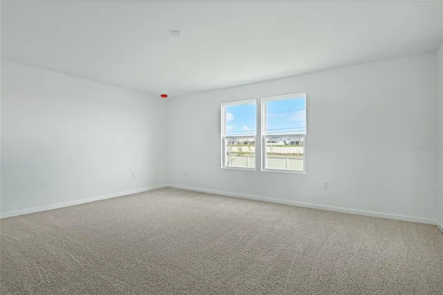 a bathroom with 2 sink and a mirror