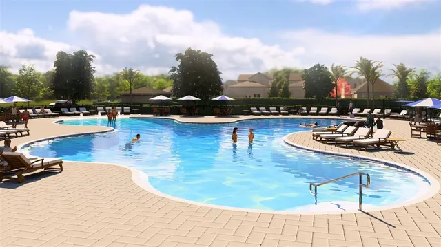 an aerial view of a swimming pool