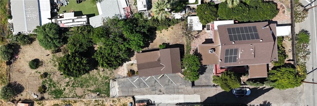 10568 Foothill Boulevard Sylmar, CA 91342 - Photo 3 of 34 an aerial view of a house with a garden