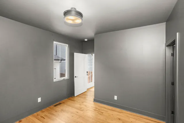 a bathroom with a sink toilet and a mirror