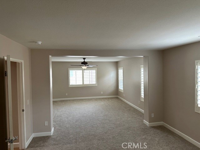 650 Winter Pine Street Beaumont, CA 92223 - Photo 18 of 32 an empty room with windows and closet