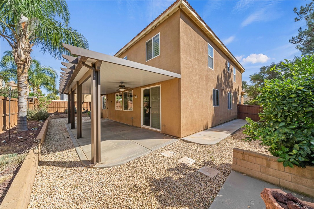 650 Winter Pine Street Beaumont, CA 92223 - Photo 28 of 32 a view of a house with a yard
