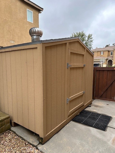 650 Winter Pine Street Beaumont, CA 92223 - Photo 32 of 32 a view of a door and wooden walls