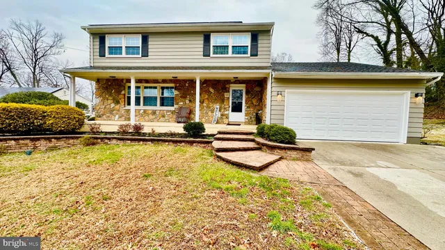front view of a house with a swimming pool