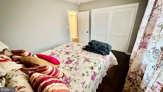 a view of a living room with furniture and gym equipment