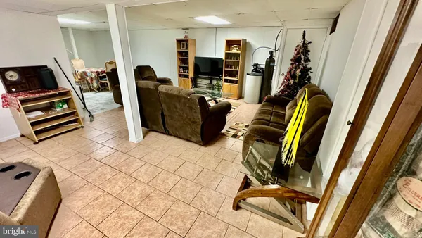 a dining room with furniture and entryway