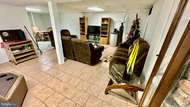 a dining room with furniture and entryway