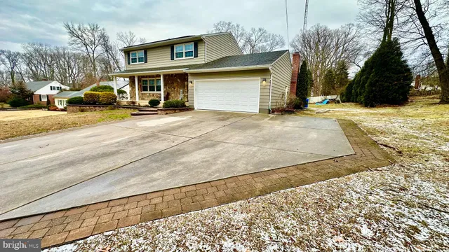 a view of a car parked on the side of a road