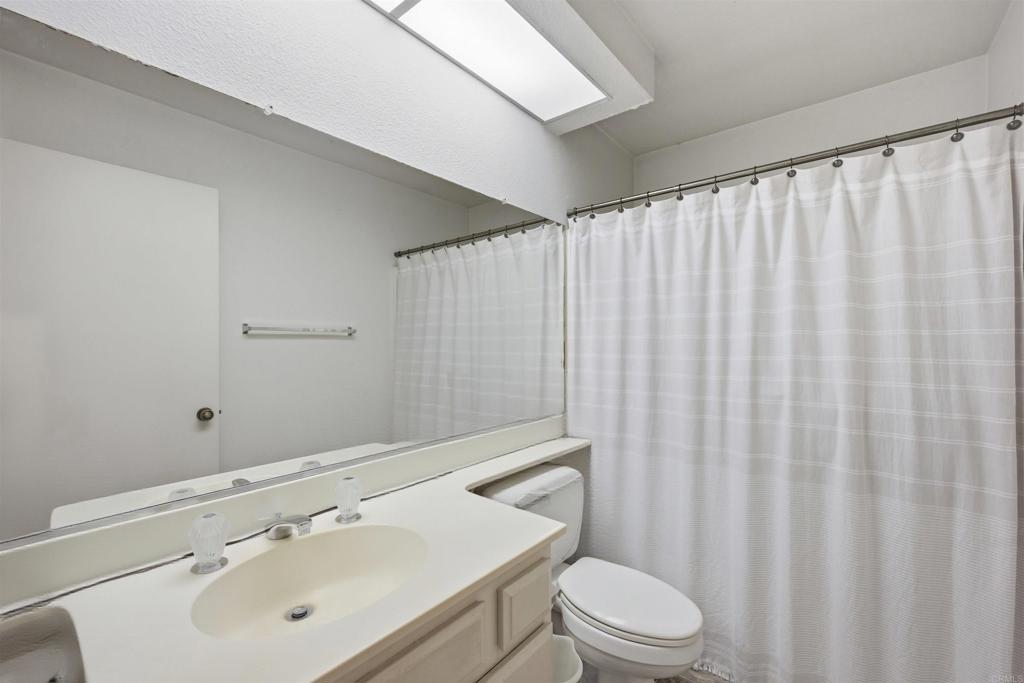 4308 Los Padres Drive Fallbrook, CA 92028 - Photo 14 of 21 a bathroom with a sink and a mirror