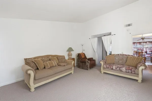 a living room with furniture and a couch