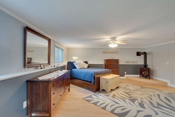 233 Ashburnham State Road Westminster, MA 01473 - Photo 23 of 42 a bedroom with a bed and a large mirror