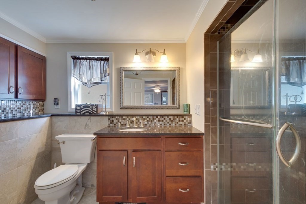 233 Ashburnham State Road Westminster, MA 01473 - Photo 24 of 42 a bathroom with a toilet a sink and mirror