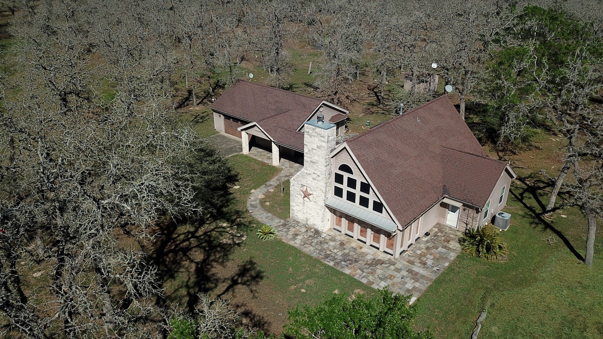 3337 Brunes Mill Road Columbus, TX 78934 - Photo 1 of 48 an aerial view of a house with a yard