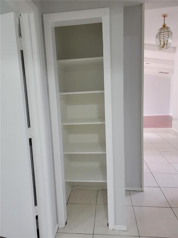 26221 Constantine Road Punta Gorda, FL 33983 - Photo 13 of 27 a view of walk in closet with empty racks
