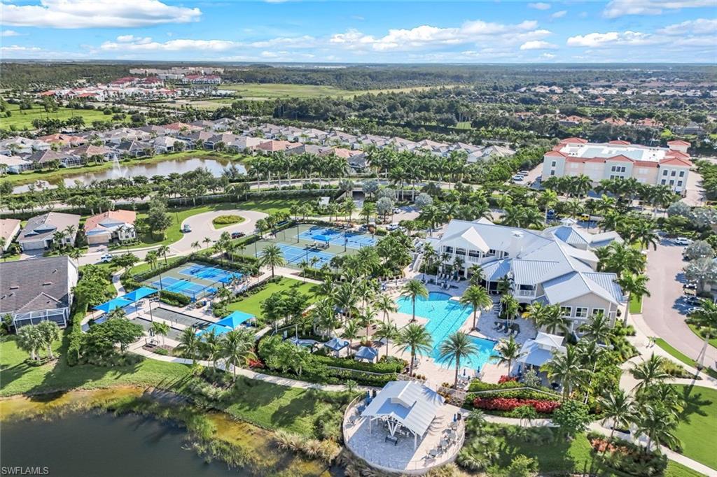 10763 Manatee Key Lane Estero, FL 33928 - Photo 28 of 33 an aerial view of residential houses with outdoor space