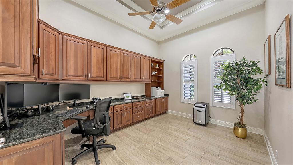 6919 Dominion Lane Lakewood Ranch, FL 34202 - Photo 17 of 99 a view of workspace with furniture and natural light