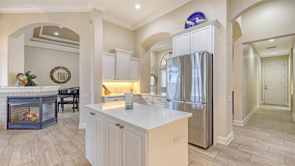 6919 Dominion Lane Lakewood Ranch, FL 34202 - Photo 25 of 99 a bathroom with a sink a mirror and a window