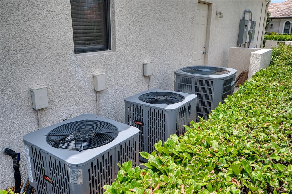 6919 Dominion Lane Lakewood Ranch, FL 34202 - Photo 87 of 99 a kitchen with a sink stove and cabinets