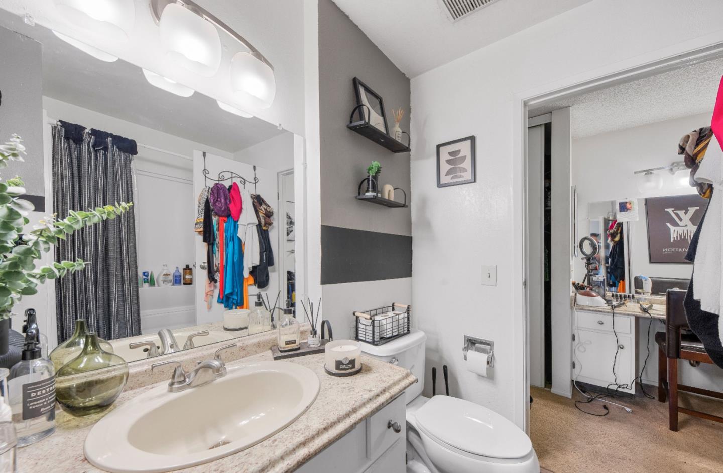 46 Grass Court Novato, CA 94949 - Photo 16 of 21 a bathroom with a toilet sink and mirror