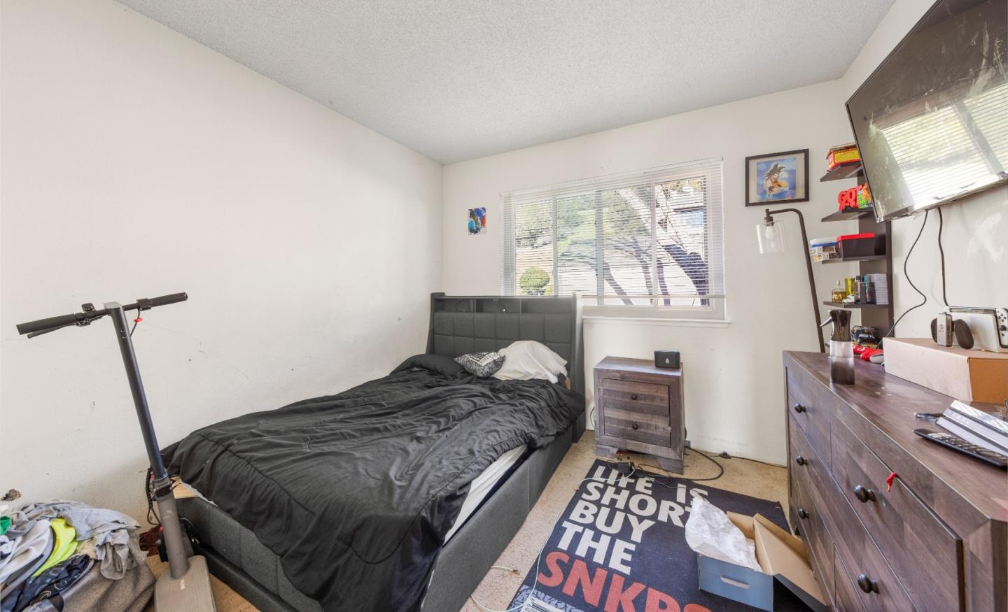 46 Grass Court Novato, CA 94949 - Photo 17 of 21 a bedroom with a bed next to a window with the outer view