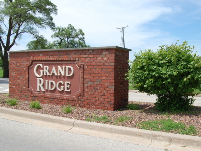 59 Casey Drive Minooka, IL 60447 - Photo 1 of 3 a sign on the side of a building