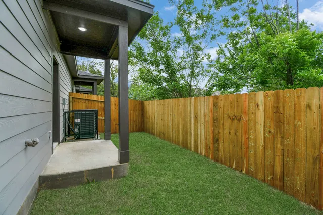 a view of a back yard of the house