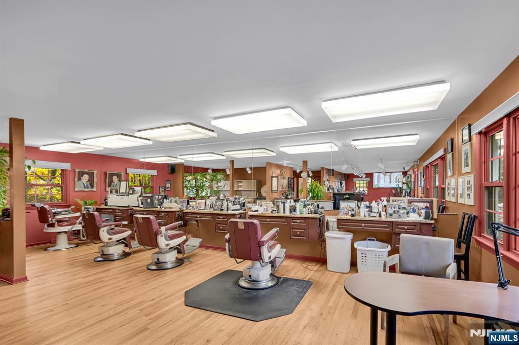 857 Pompton Avenue Cedar Grove, NJ 07009 - Photo 11 of 16 a room with lots of table and chairs