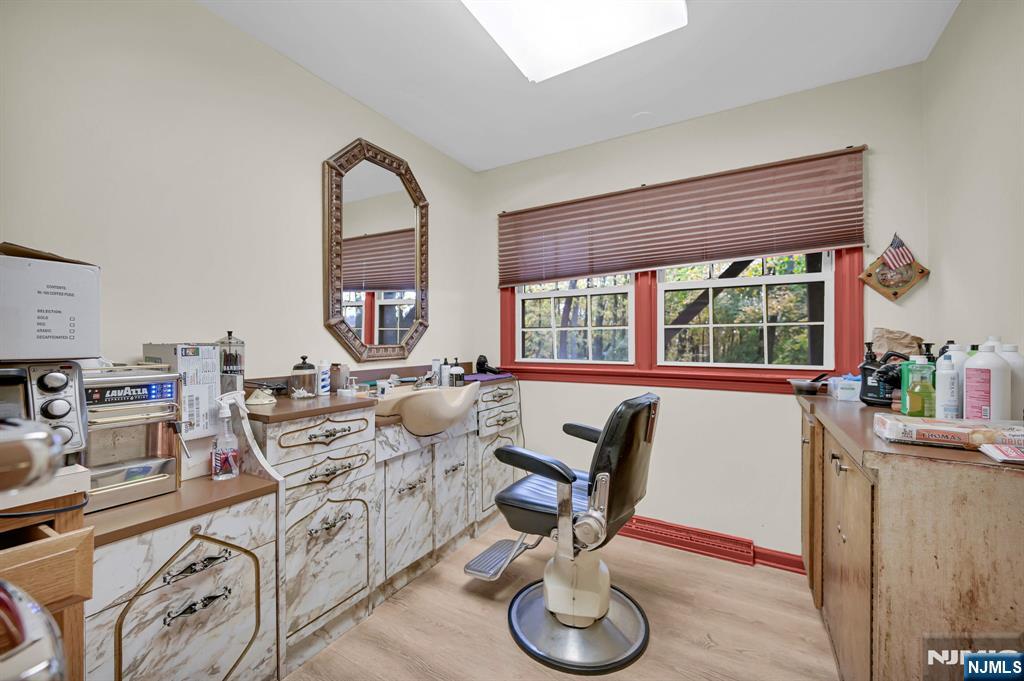 857 Pompton Avenue Cedar Grove, NJ 07009 - Photo 15 of 16 a living room with furniture fireplace and a large window