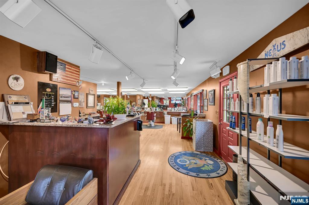 857 Pompton Avenue Cedar Grove, NJ 07009 - Photo 8 of 16 a living room with furniture and a wooden floor