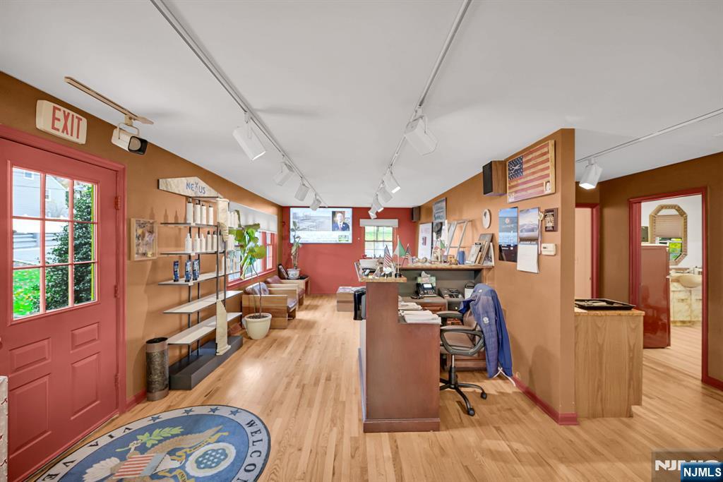 857 Pompton Avenue Cedar Grove, NJ 07009 - Photo 9 of 16 a view of a dining room with furniture window and wooden floor