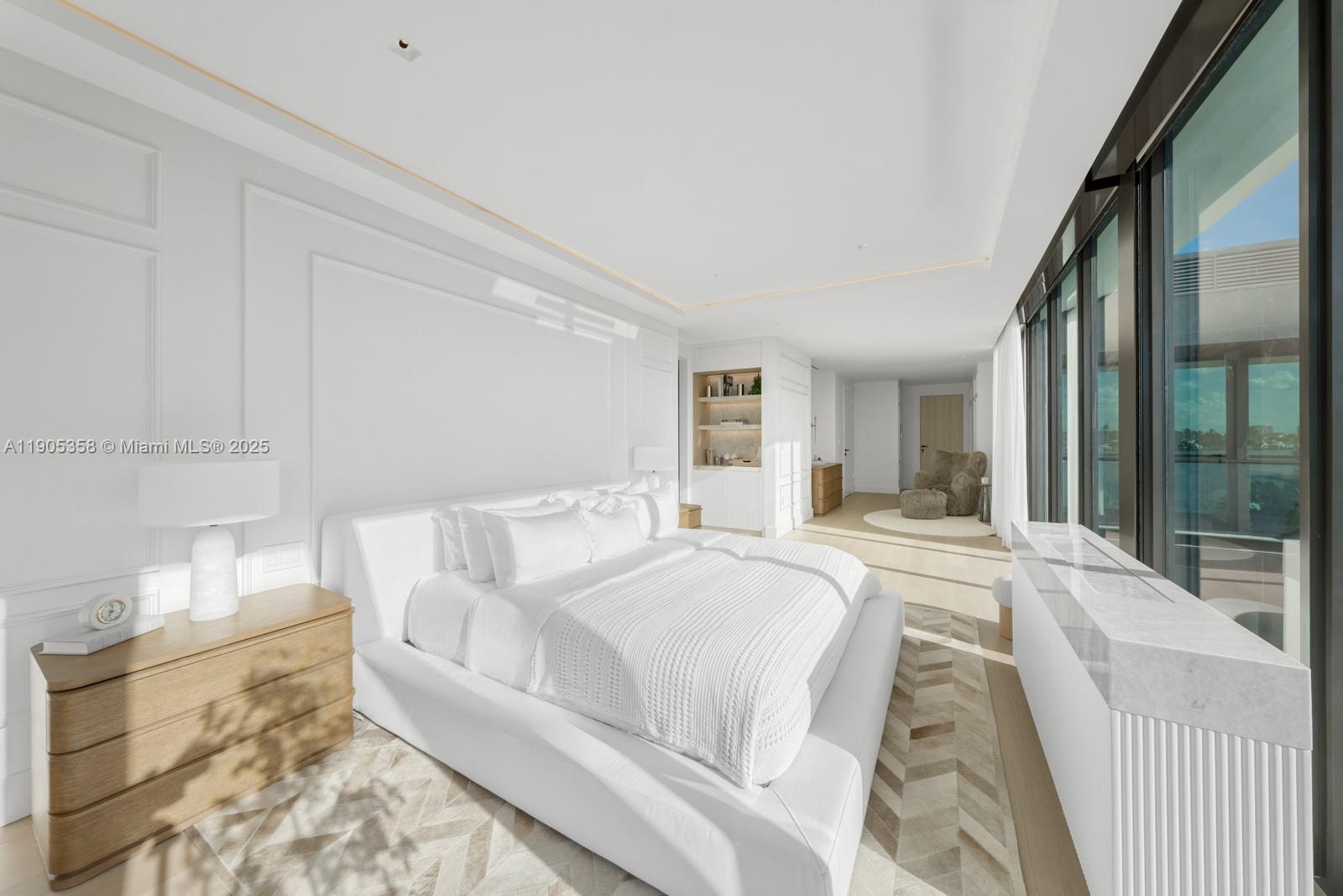 1165 North Biscayne Point Road Miami Beach, FL 33141 - Photo 13 of 31 a living room with furniture and a large window