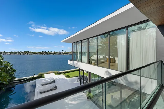 a view of swimming pool with outdoor seating