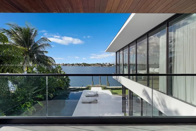 a view of swimming pool with a patio