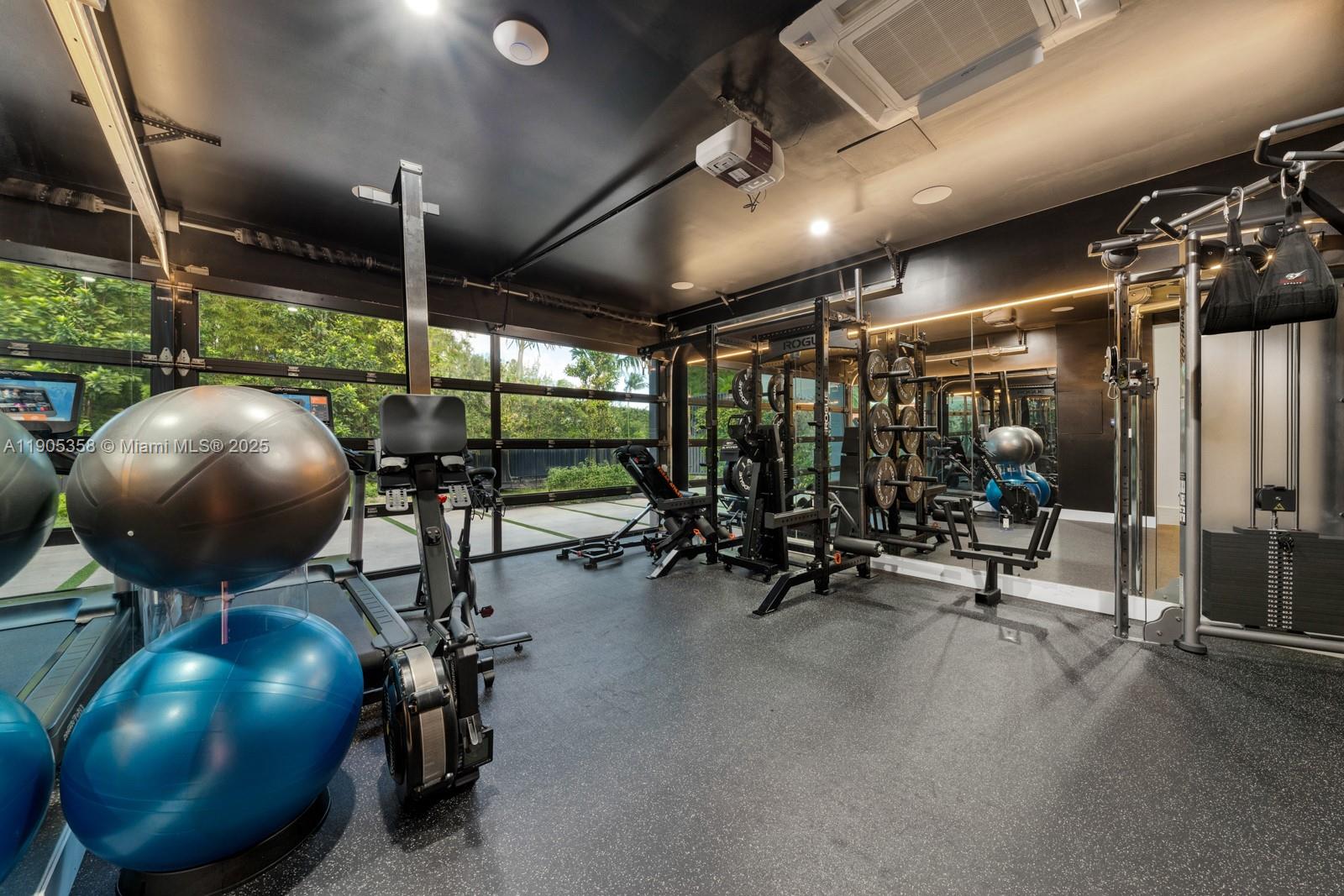 1165 North Biscayne Point Road Miami Beach, FL 33141 - Photo 26 of 31 a room with gym equipment