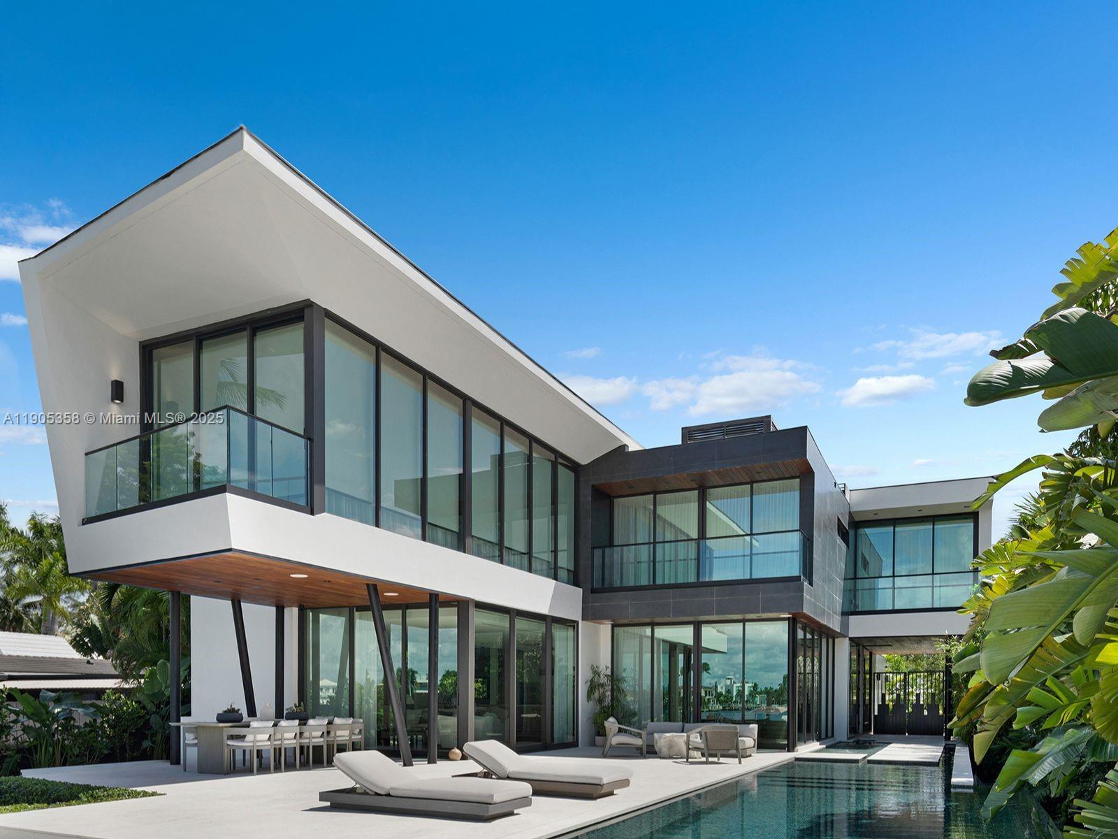 1165 North Biscayne Point Road Miami Beach, FL 33141 - Photo 30 of 31 a front view of a building with street view