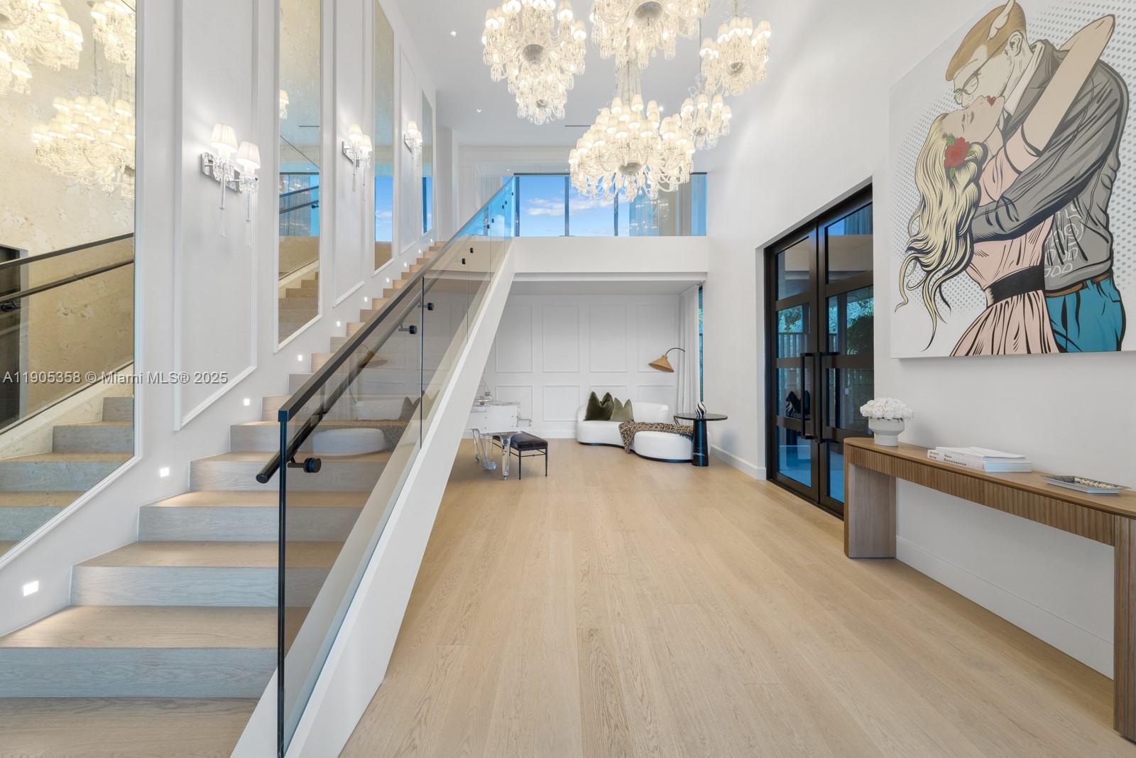 1165 North Biscayne Point Road Miami Beach, FL 33141 - Photo 10 of 31 a view of a livingroom with furniture and stairs