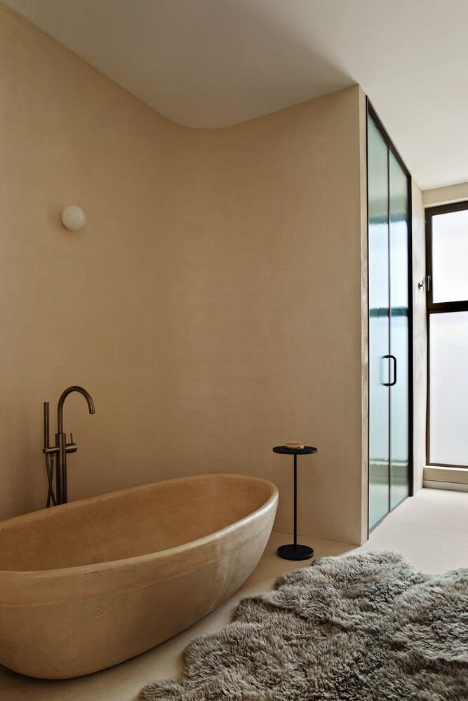 68 Commercial Street, Unit PH Brooklyn, NY 11222 - Photo 16 of 27 a bathroom with a bathtub and a window