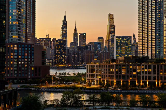 a view of a city with tall buildings