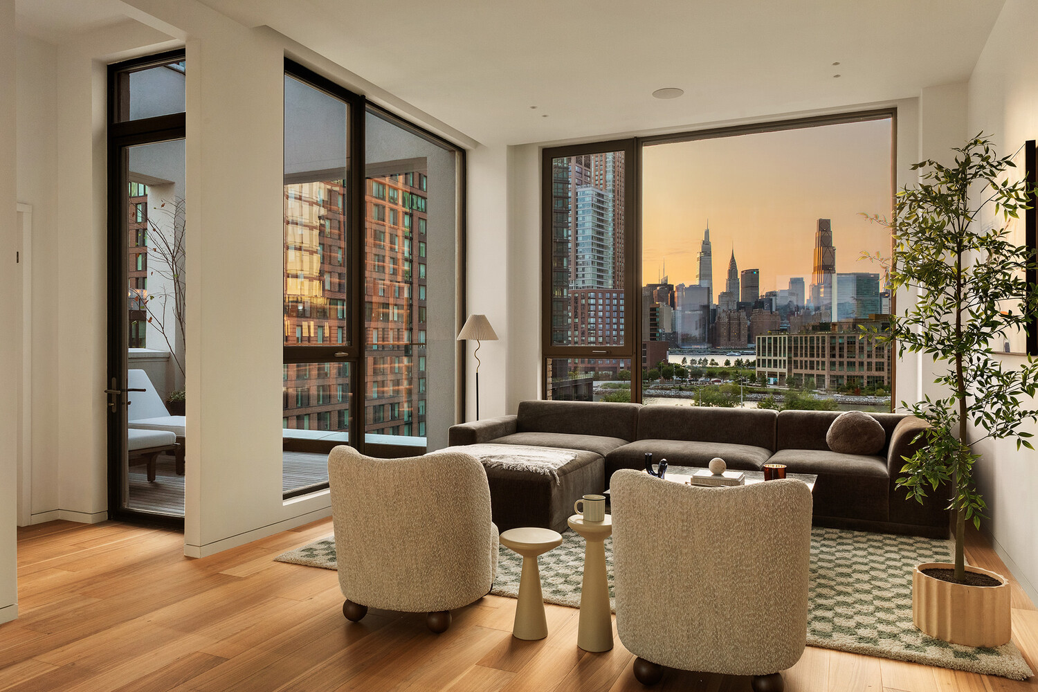 68 Commercial Street, Unit PH Brooklyn, NY 11222 - Photo 2 of 27 a living room with furniture and a floor to ceiling window