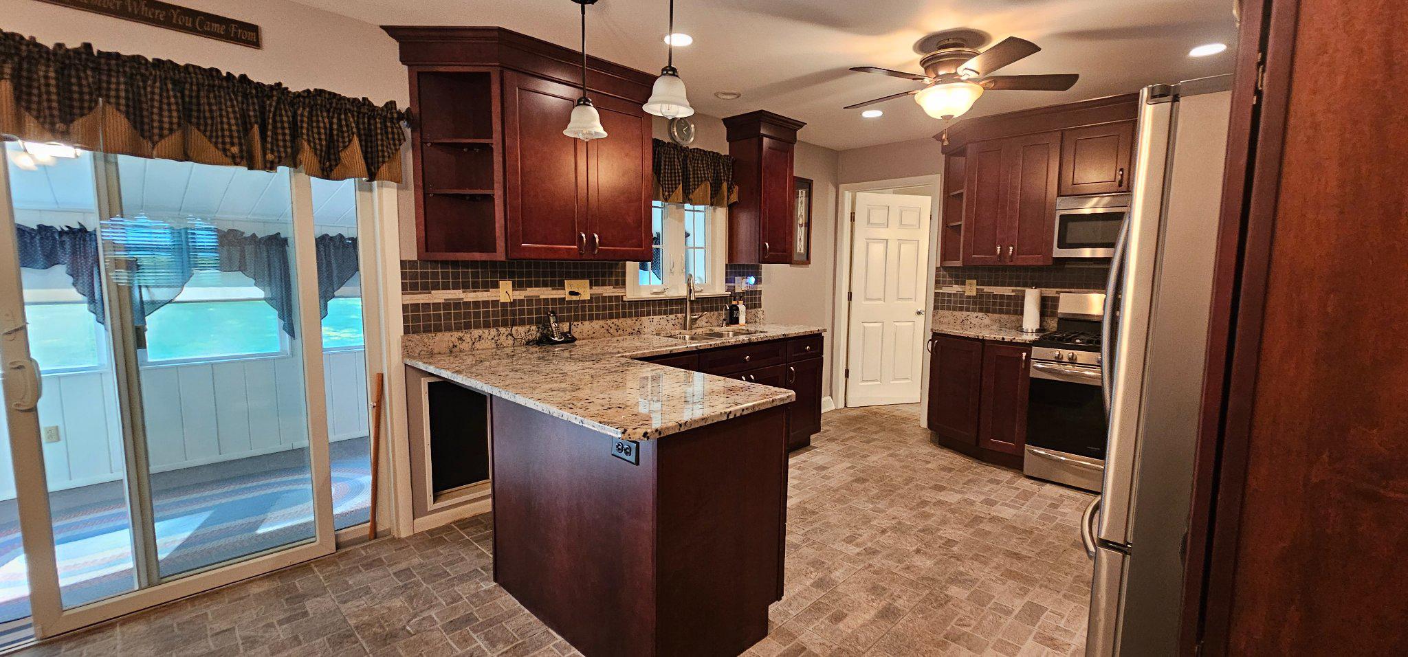 65 Randolph Road Bridgeton, NJ 08302 - Photo 6 of 29 Custom cabinetry & granite island
