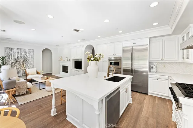 a living room with furniture fireplace and flat screen tv