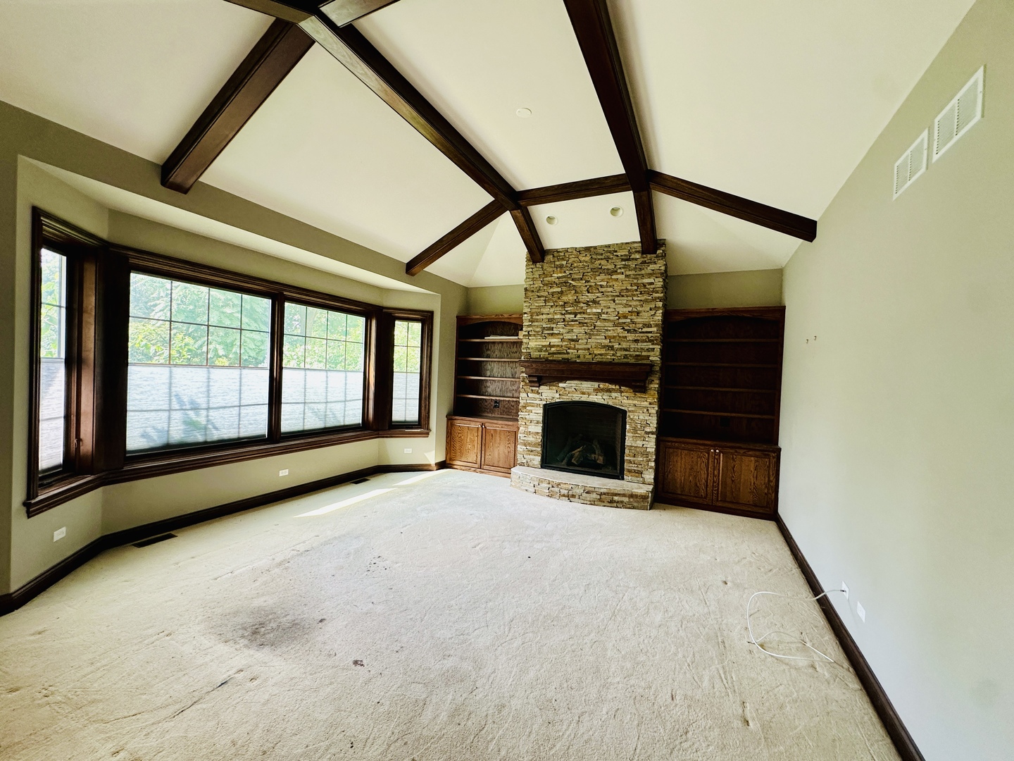 8207 West 30th Street North Riverside, IL 60546 - Photo 12 of 39 a view of an empty room with a fireplace and a window