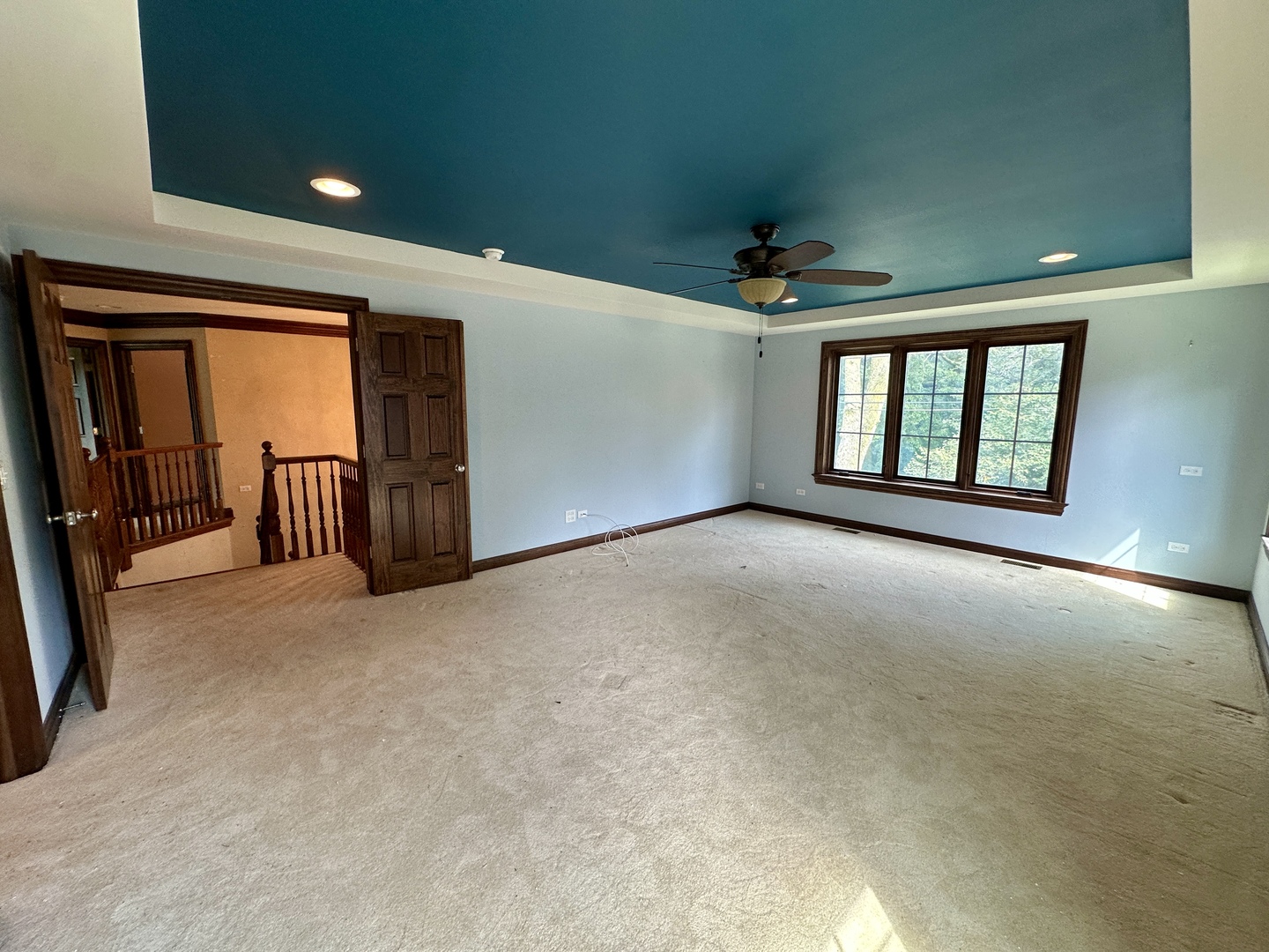 8207 West 30th Street North Riverside, IL 60546 - Photo 23 of 39 a view of a livingroom with a chandelier fan and windows