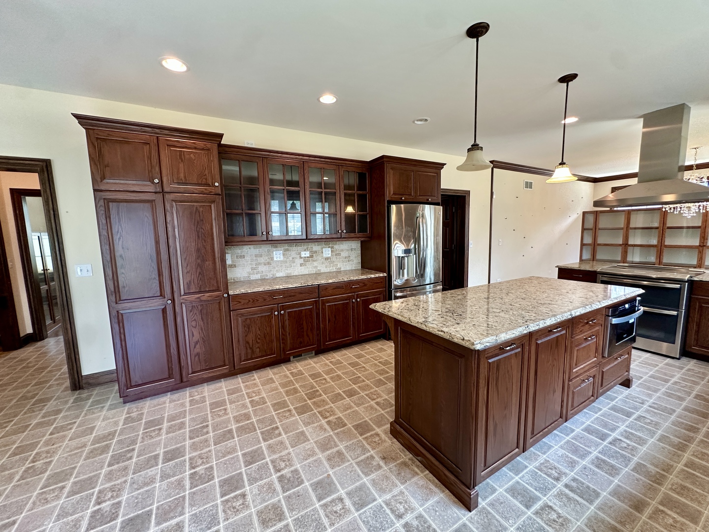 8207 West 30th Street North Riverside, IL 60546 - Photo 6 of 39 a kitchen with stainless steel appliances granite countertop a stove a refrigerator a sink and dishwasher