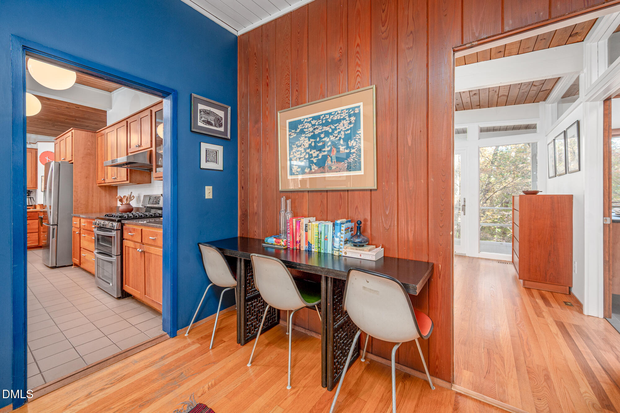 1030 Highland Woods Road Chapel Hill, NC 27517 - Photo 12 of 64 a dining room with furniture and wooden floor
