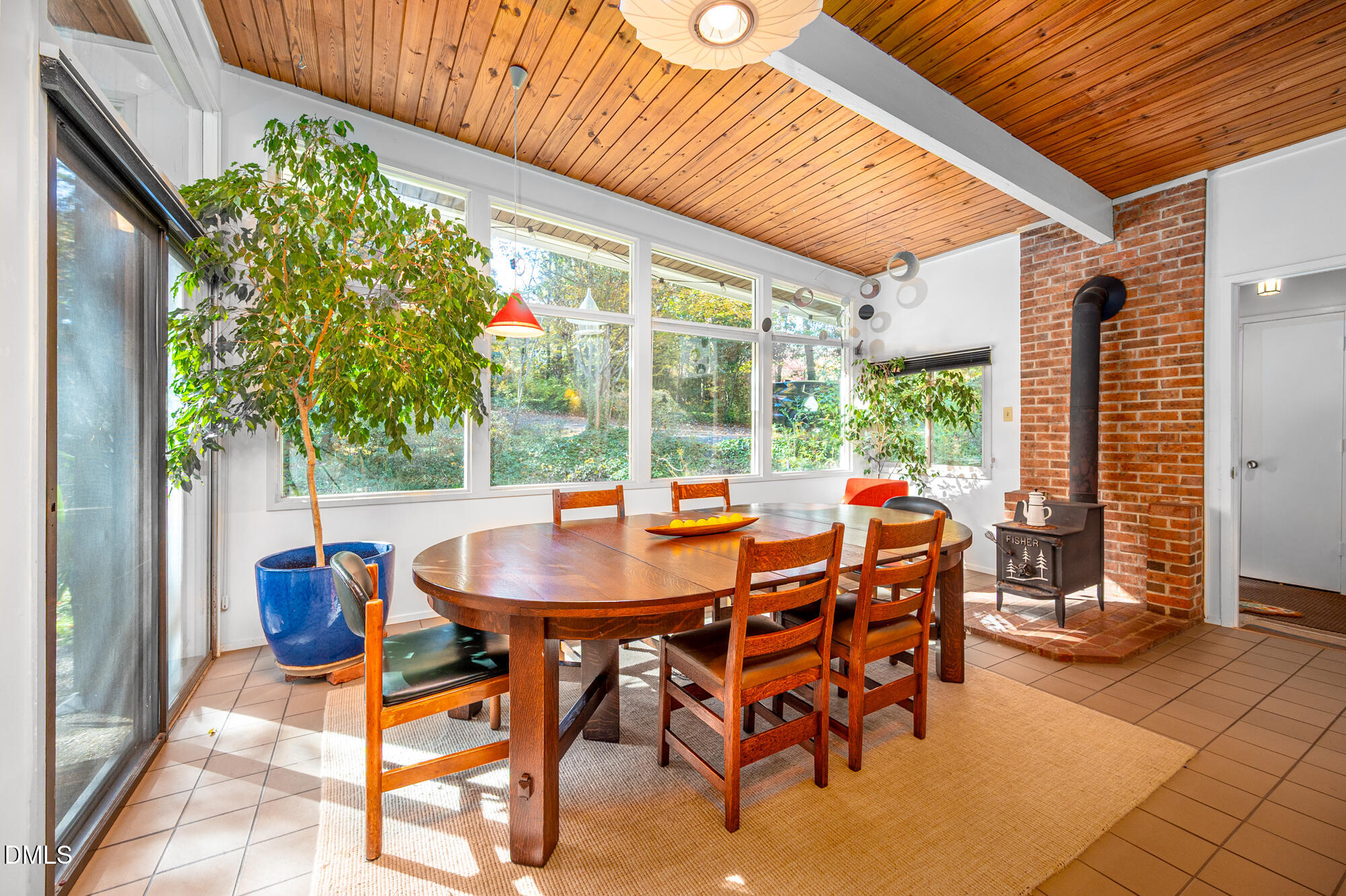 1030 Highland Woods Road Chapel Hill, NC 27517 - Photo 14 of 64 a outdoor dining space with furniture and garden view