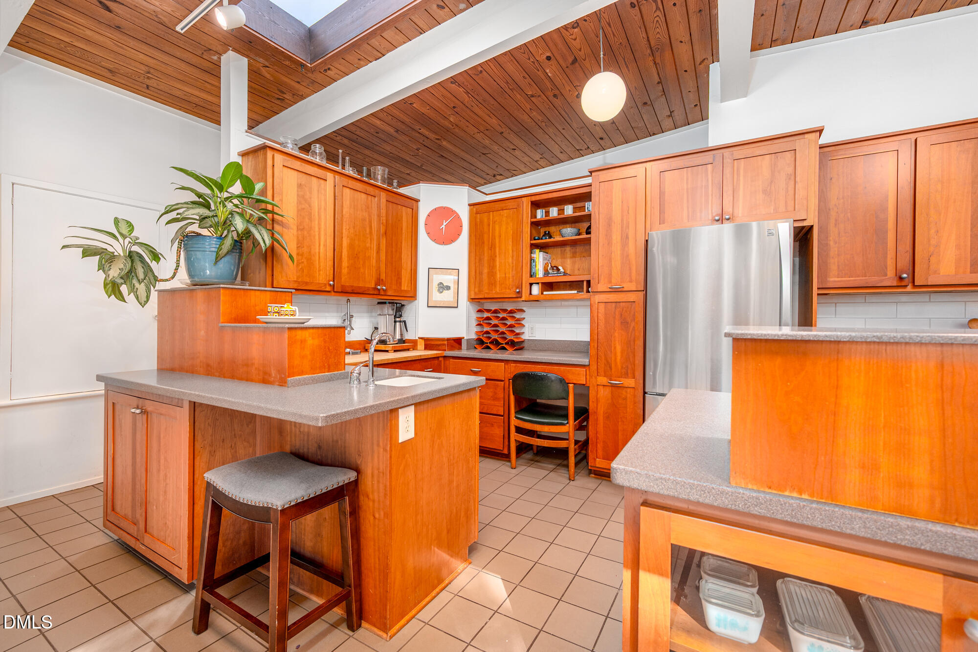 1030 Highland Woods Road Chapel Hill, NC 27517 - Photo 18 of 64 a view of a kitchen with furniture and a window