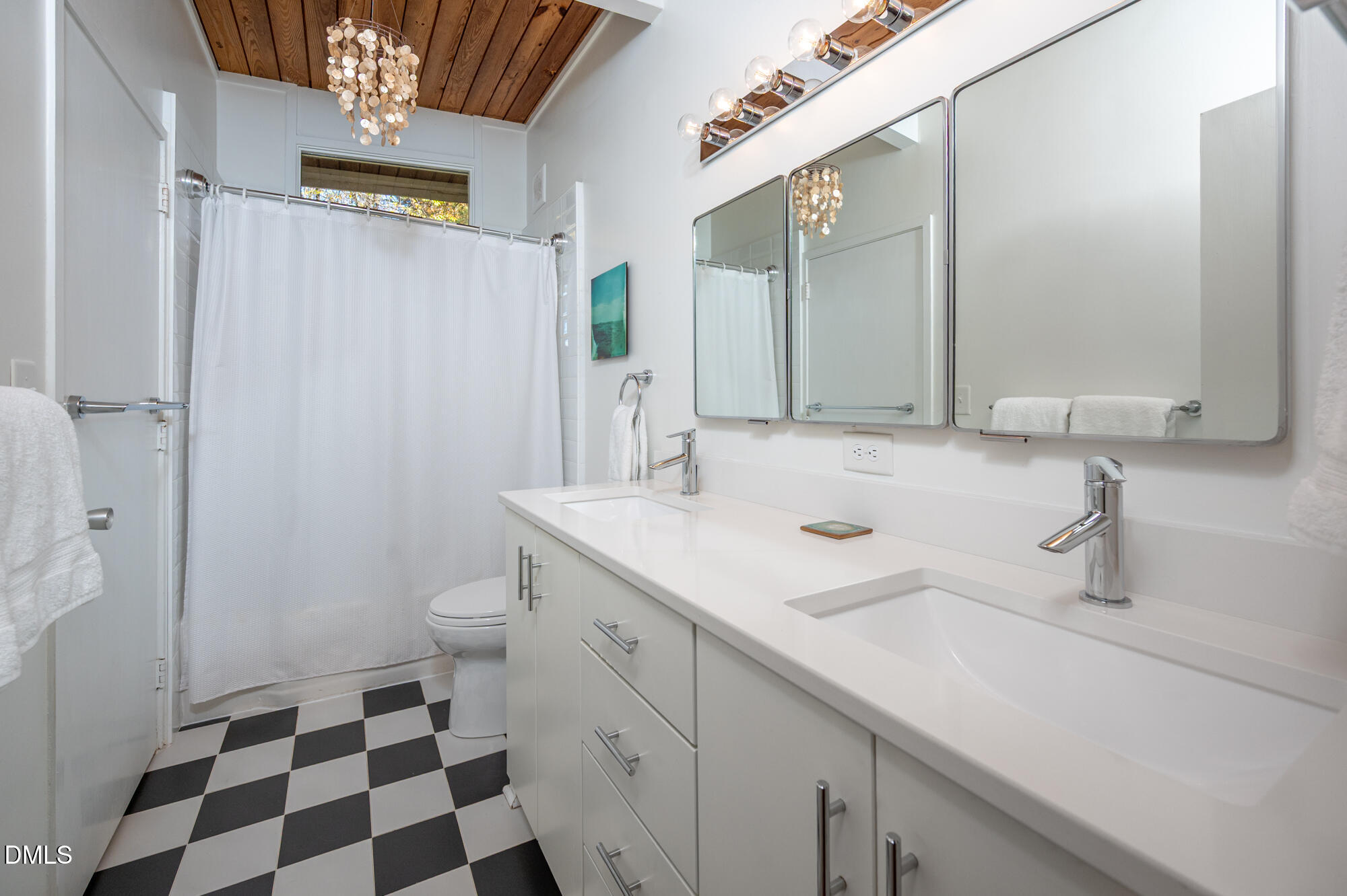 1030 Highland Woods Road Chapel Hill, NC 27517 - Photo 34 of 64 a bathroom with a sink a toilet a shower and a mirror