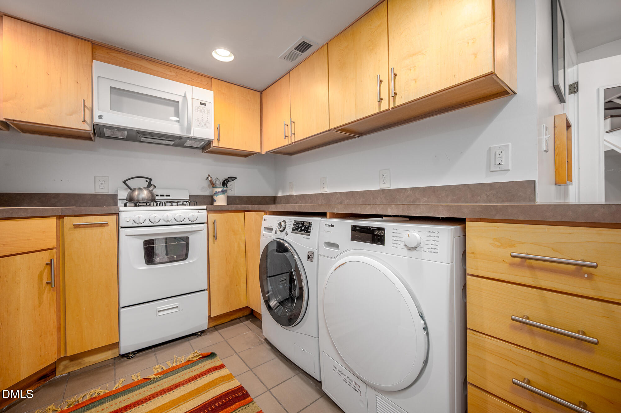 1030 Highland Woods Road Chapel Hill, NC 27517 - Photo 44 of 64 a utility room with dryer and washer